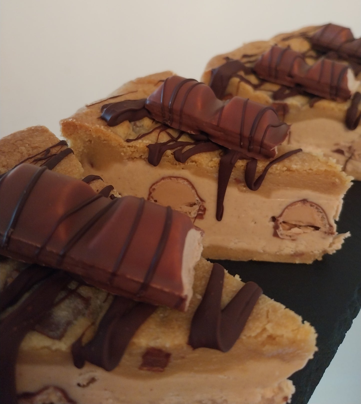 4 slices of kinder bueno cookie pie slices