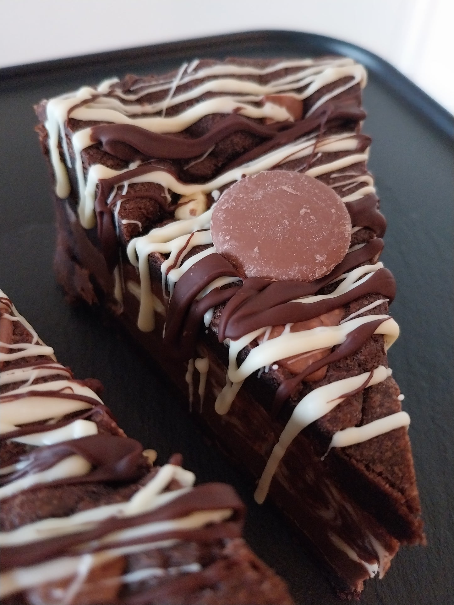 A slice of triple chocolate cookie pie