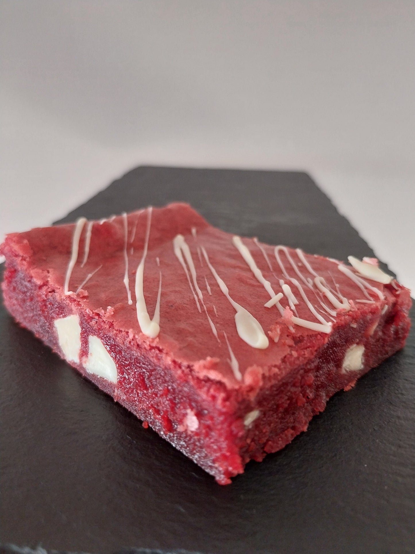 A close up of a red velvet brownie