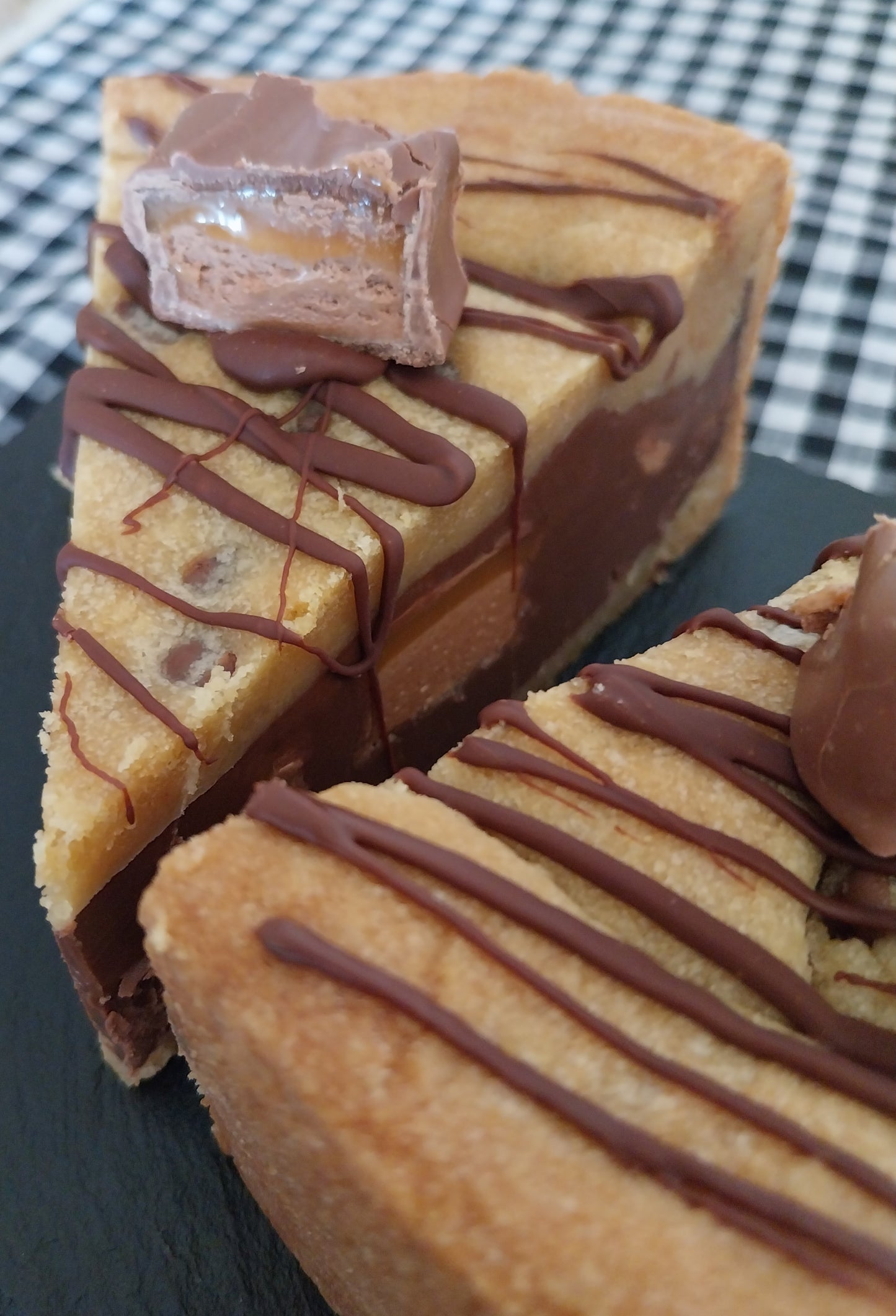 Two slices of Mars Bar cookie pie