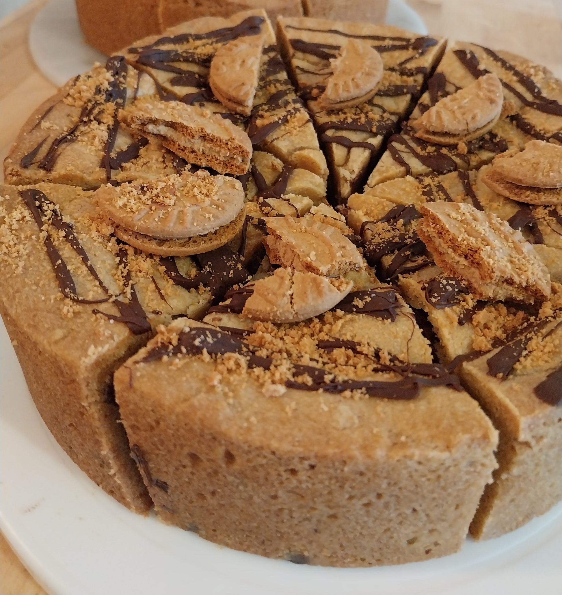 Whole Biscoff cookie pie sliced into 8 pieces